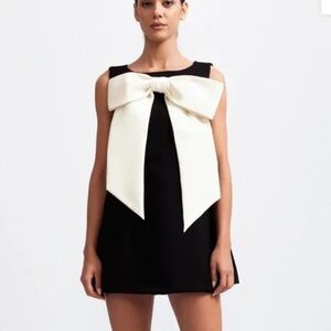 Sierra Darien little black dress with oversized cream bow!